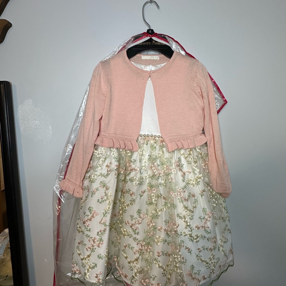 5T formal dress. Worn once. Has a slight pen mark, just needs to be dry cleaned.